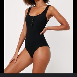 Women's black ribbed one piece bodysuit medium new